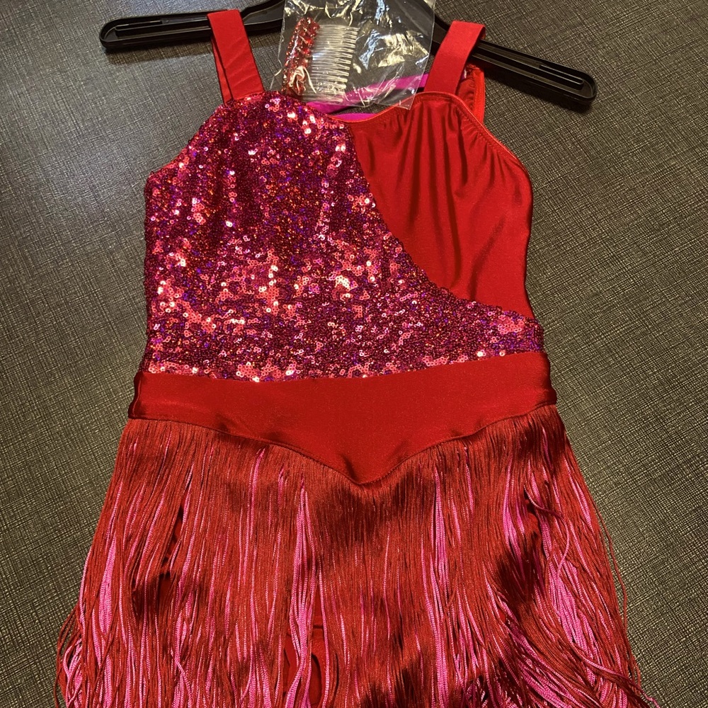 New dance costume. Revolution “Feel the Rhythm” size medium child dance costume.